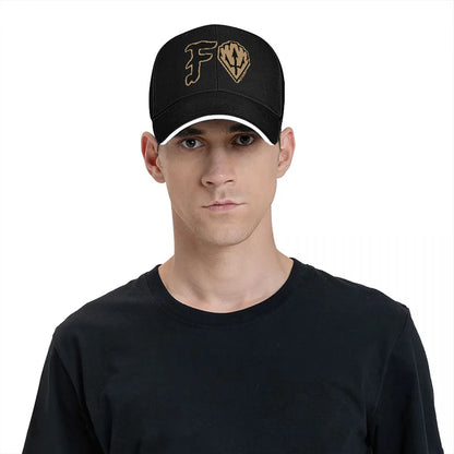 FORTNITE BASEBALL CAP WITH GOLD LOGO DESIGN BLACK AND WHITE TRIM ADJUSTABLE FIT FOR GAMING FANS AND STYLE ENTHUSIASTS