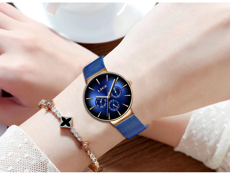 LIGE women’s watch, elegant and on-trend – sporty-casual style, mesh strap, quartz movement, date and day display, water-resistant.
