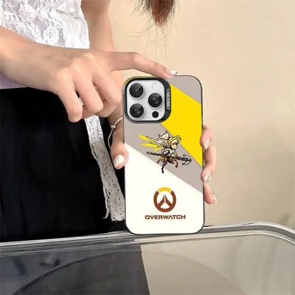 „Game O-Overwatch“ pikselinio stiliaus telefono dėklas iPhone 17 16 15 14 13 12 11 Pro MAX, matinis, atsparus smūgiams, nugarėlės apsauga nuo kritimų